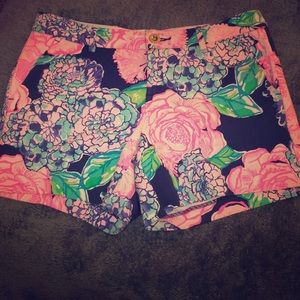 Lily Pulitzer floral shorts.